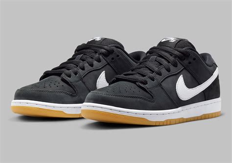 black nike dunks low|black 2.5 nike dunk lows.